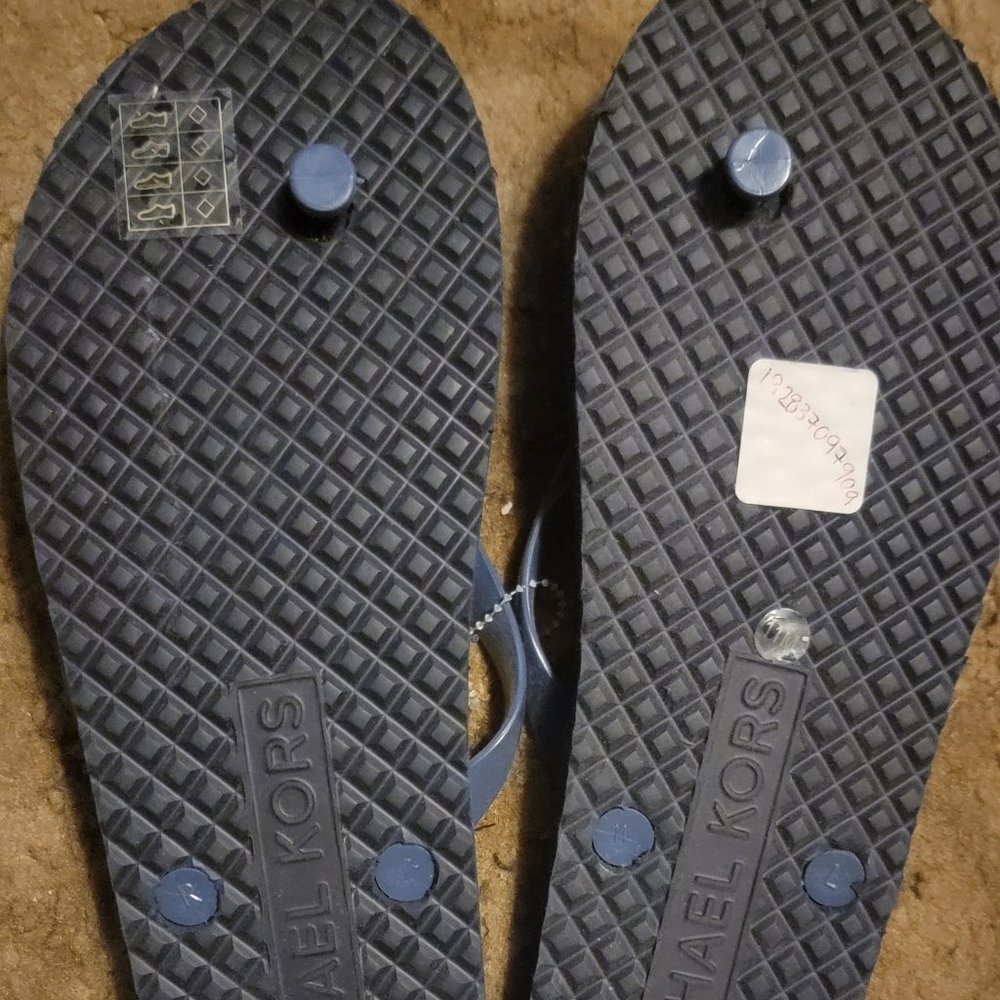 3 pair of Michael Kors flip flops